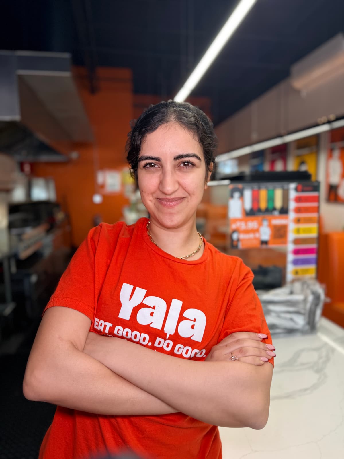 Staff portrait - orange shirt